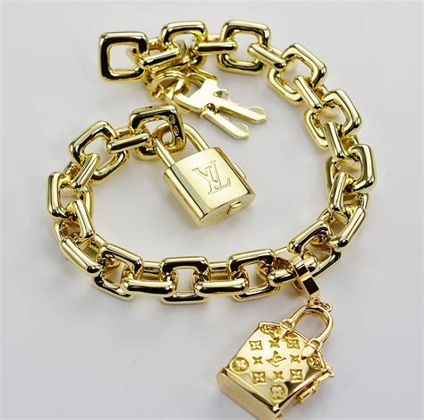 Louis Vuitton Solid 18K Gold Charm Bracelet with Purse Charm 3.80 Ounces Solid 18K Gold ...