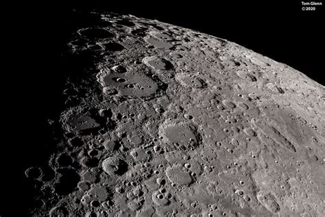 The Moon's south pole is near the top of this detailed telescopic view. Looking across the ...