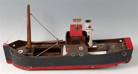 A Lines Brothers (pre Tri-Ang) wooden model tramp steamer 'British Trader' with clockwork motor m