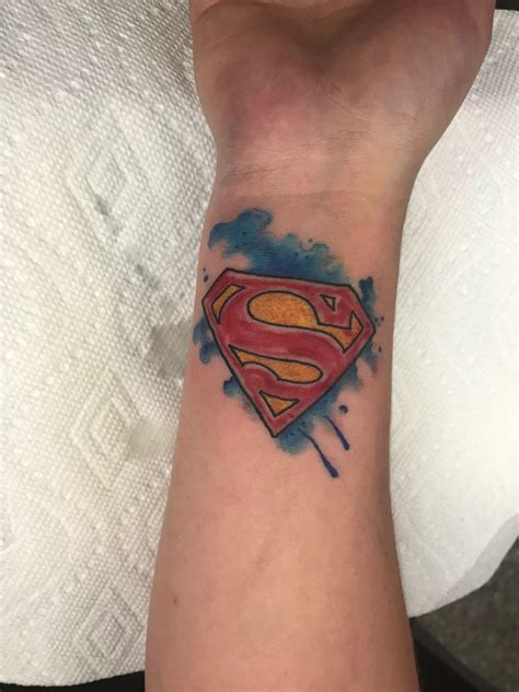 Watercolor SuperMan logo cartoon tattoo | Superman tattoos, Tattoos ...