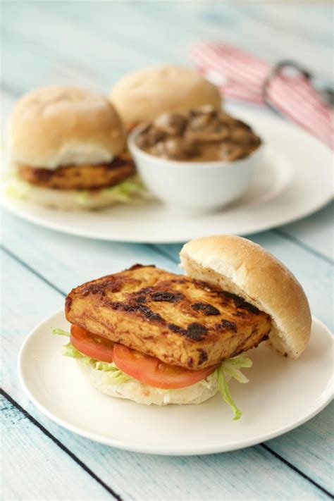 Delicious vegan tofu burger - baked and marinaded tofu topped with the richest creamiest ...