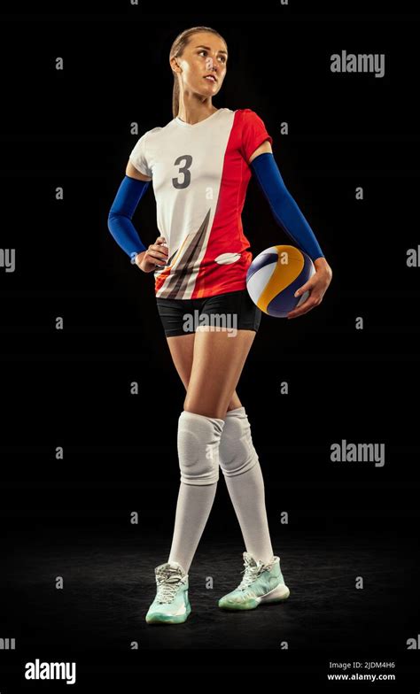 Portrait of beautiful woman, professional volleyball player posing with ...