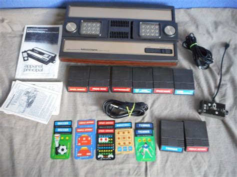 Mattel Intellivision console with cables, controllers and 8 games ...