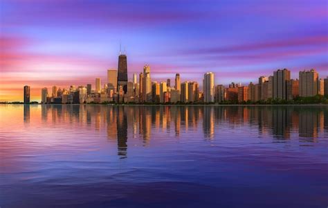 Premium Photo | Colorful sunset above chicago skyline across lake michigan