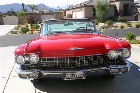 1960 Cadillac Coupe (cherry red with while leather) | Luxury4Play.com