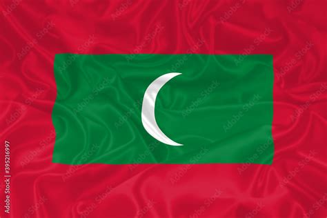 Maldives Flag waving. National flag of Maldives with waves and wind ...