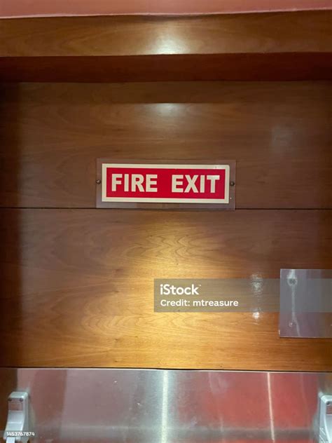 Image Of Rectangular Red And White Fire Exit Sign On Emergency ...