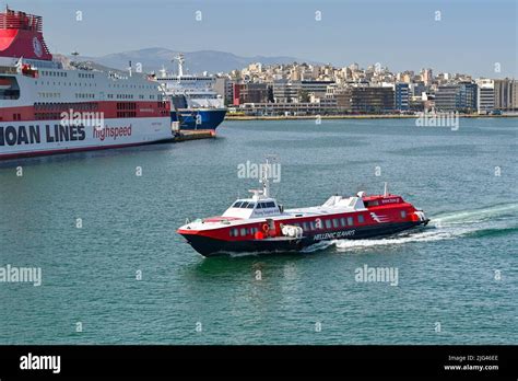 Athens, Greece - May 2022: Fast hydrofoil passenger ferry arriving in Piraeus from one of the ...