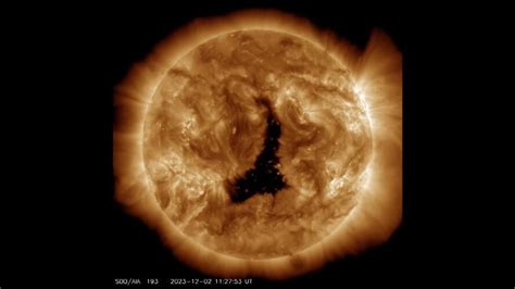 VIDEO: Dark 'hole' wider than 60 Earths currently seen on sun