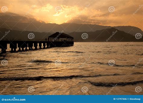 Hanalei Pier at sunset stock photo. Image of dramatic - 12797446