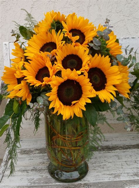 A large presentation of all sunflowers accented with a variety of greenery. Sunflower Bouquets ...