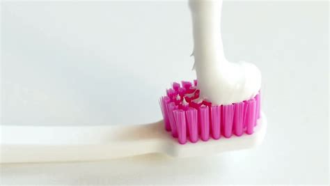 Applying Toothpaste On a Toothbrush Stock Footage Video (100% Royalty ...