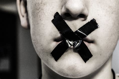 silence | teenage boy with black duct tape over his mouth | Rebecca Barray | Flickr