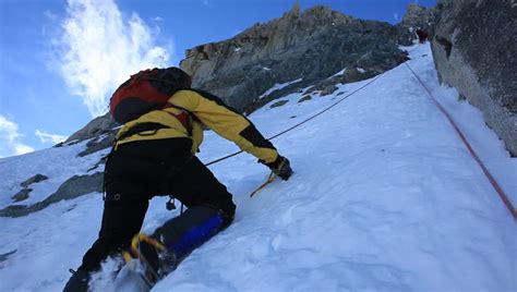 Mountaineer Climbs A Steep Iced Mountain. Mont Blanc, France. Stock Footage Video 5365466 ...