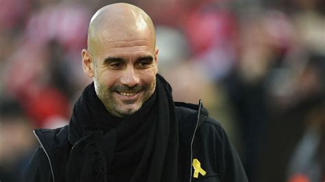 Why does Pep Guardiola wear a yellow ribbon? The meaning behind Man City boss' gesture | Goal.com