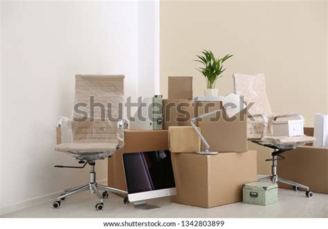 Moving Boxes Furniture New Office Stock Photo (Edit Now) 1342803899