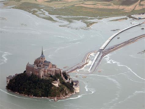 Normandy 'island' Mont Saint-Michel cut off by extreme high tide | The ...