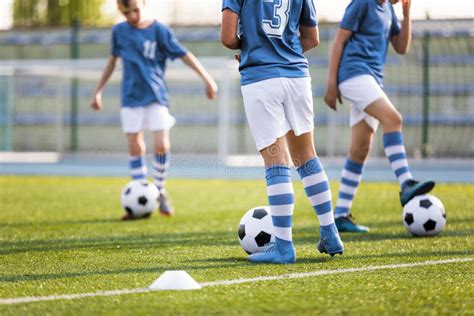 Legs of Soccer Players Kicking Balls on Training Pitch. Football Soccer Background Stock Image ...