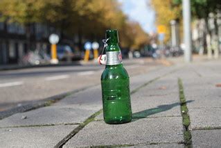 Beer bottle on the street | Used for an article about using … | Flickr