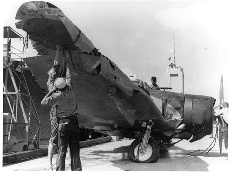 [Photo] US Sailors examine wreckage of Japanese Aichi D3A “Val” dive bomber that crashed during ...