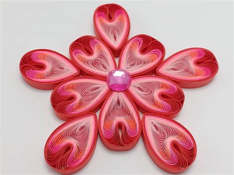 Four colours shell shape quilling flower