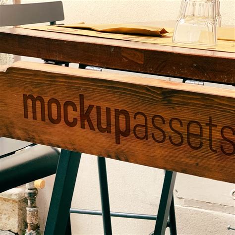 Free Burnt Wood Table Logo Mockup PSD