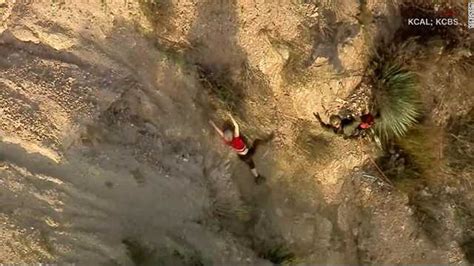 Hiker dangling off California cliff saved by helicopter