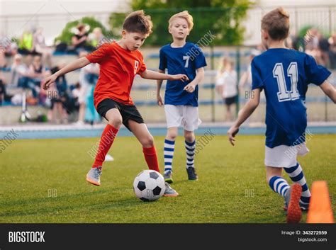 Young Boys Playing Image & Photo (Free Trial) | Bigstock