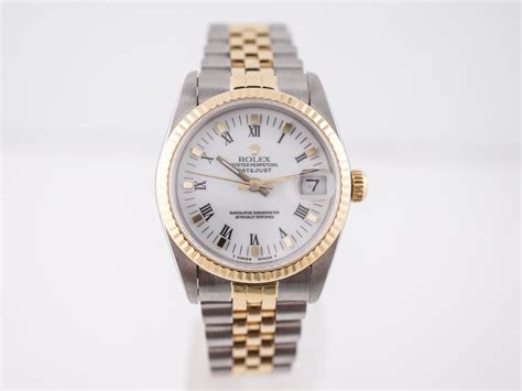 Rolex Datejust in 18k Yellow Gold & Sterling Silver - Filigree Jewelers