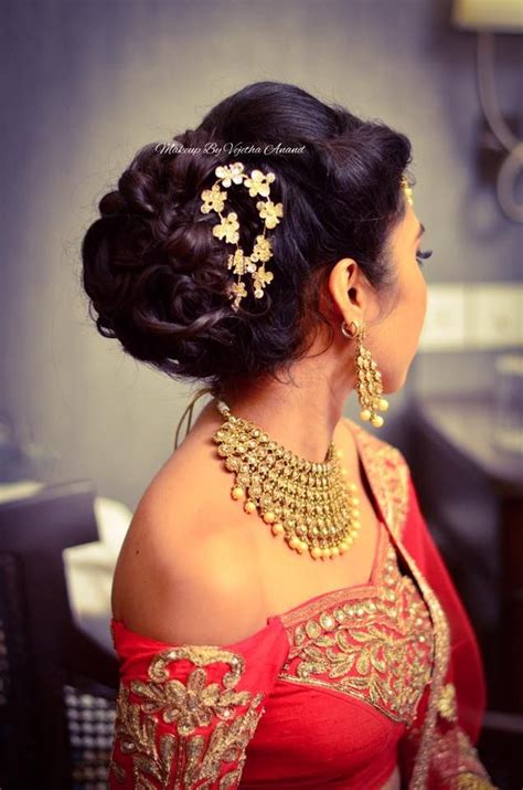 Indian bride's reception hairstyle by Vejetha for Swank Studio. Bridal ...