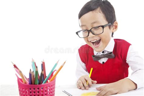 Cheerful Pupil Drawing with Crayons Stock Photo - Image of pencil, education: 26051946