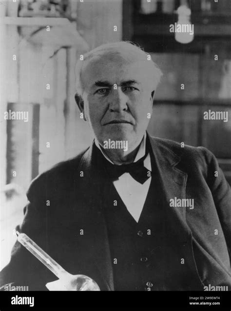 Thomas Edison in lab with "Edison Effect" bulbs. Year: 1919. Location: West Orange, New Jersey ...