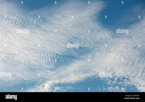 Cirrocumulus clouds, sometimes known as a 'mackerel sky' (UK Stock Photo - Alamy