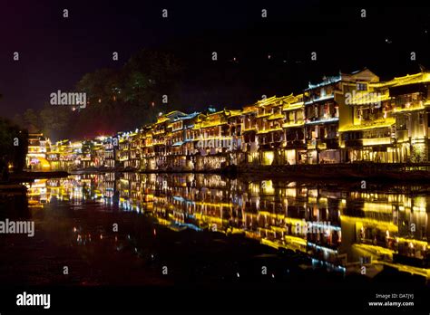 Fenghuang ancient town at night Stock Photo - Alamy