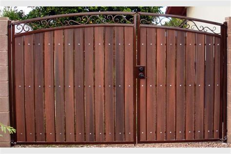 Decorative Arched RV Gate with Rust and Redwood | Wood gate, Door gate design, Fence design