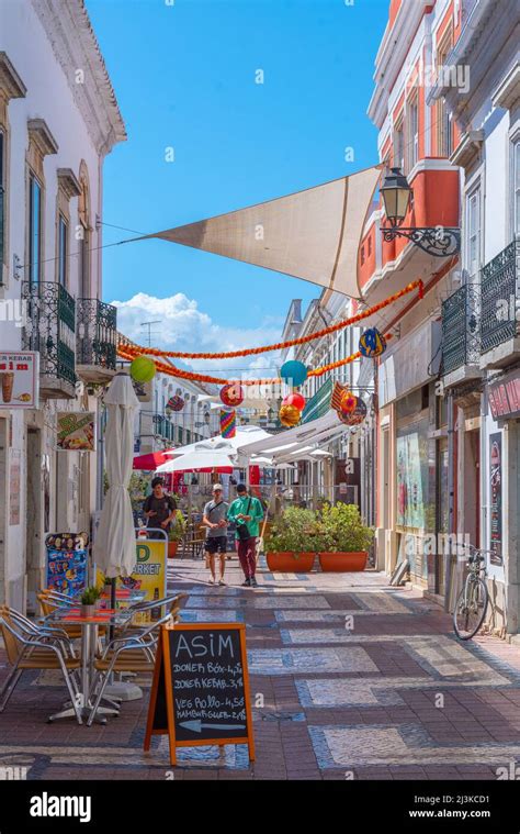 Faro, Portugal, June 18, 2021: Commercial street of the old town at ...