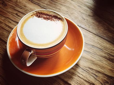 Brown Ceramic Coffee Mug on Saucer · Free Stock Photo