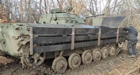 Russian BMP-2 with a wooden fence as added "armor". : r/TankPorn