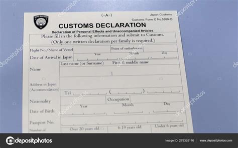 Customs declaration form at airport counter Stock Photo by ©imagesbykenny 279325176