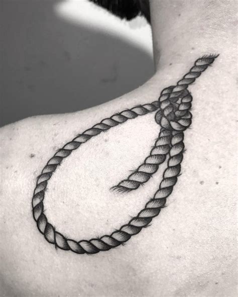 Hangman’s knot tattoo on the shoulder - Tattoogrid.net