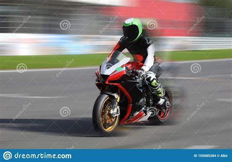 Motorcycle Racer in Helmet at High Speed Racing Stock Photo - Image of ...