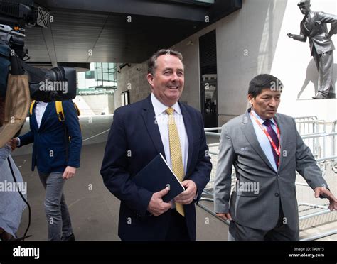 Liam Fox, Secretary of State for International Trade and President of the Board of Trade, leaves ...