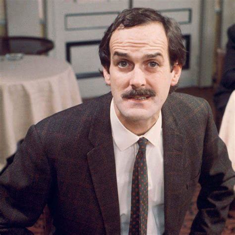 John Cleese as Basil Fawlty | Fawlty towers, Monty python, Comedy films