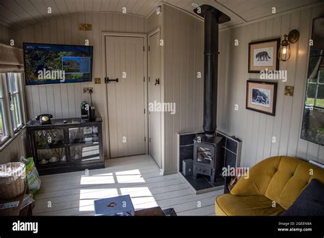 Interior view of an interior of the small cabin in a field by the ...