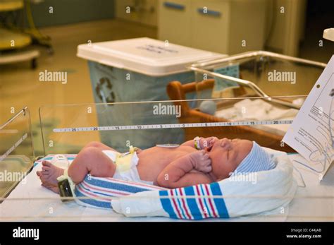 Newborn Baby Boy in Hospital Nursery Stock Photo - Alamy