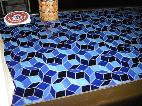 http://www.eschertile.com/penrose/guetta2.JPG | Penrose tiling, English ...