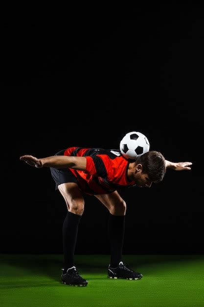 Free Photo | Soccer player do tricks with ball