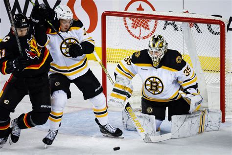 Linus Ullmark’s record-setting night sparks Bruins’ OT win over Flames