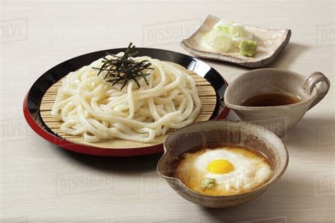 Tororo Udon with grated yam and egg (Japan) - Stock Photo - Dissolve