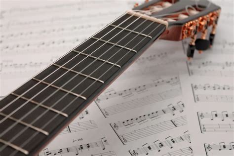 Riff-Mag.com - How to tune a guitar with harmonics [Updated December 2023]